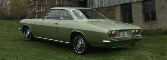 Western Pennsylvania Corvair Club 7-00-2018 raffle - 1969 Corvair 500 - green car and barn.left rear