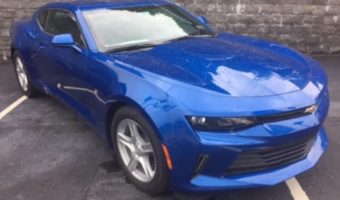 Holy Trinity Catholic School 9-15-2018 car raffle - 2018 Blue Camaro 1LT Coupe or $10,000 Cash - right front