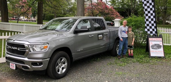 Suffield 350th Anniversary Celebration 9-08-2019 raffle - 2019 RAM 1500 Big Horn Crew Cab pick-up - left front with sign