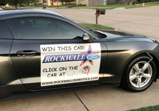 Rockwall HS Robotics Booster Club Inc.12-14-2019 raffle - 2019 Ford Mustang - right front with sign 