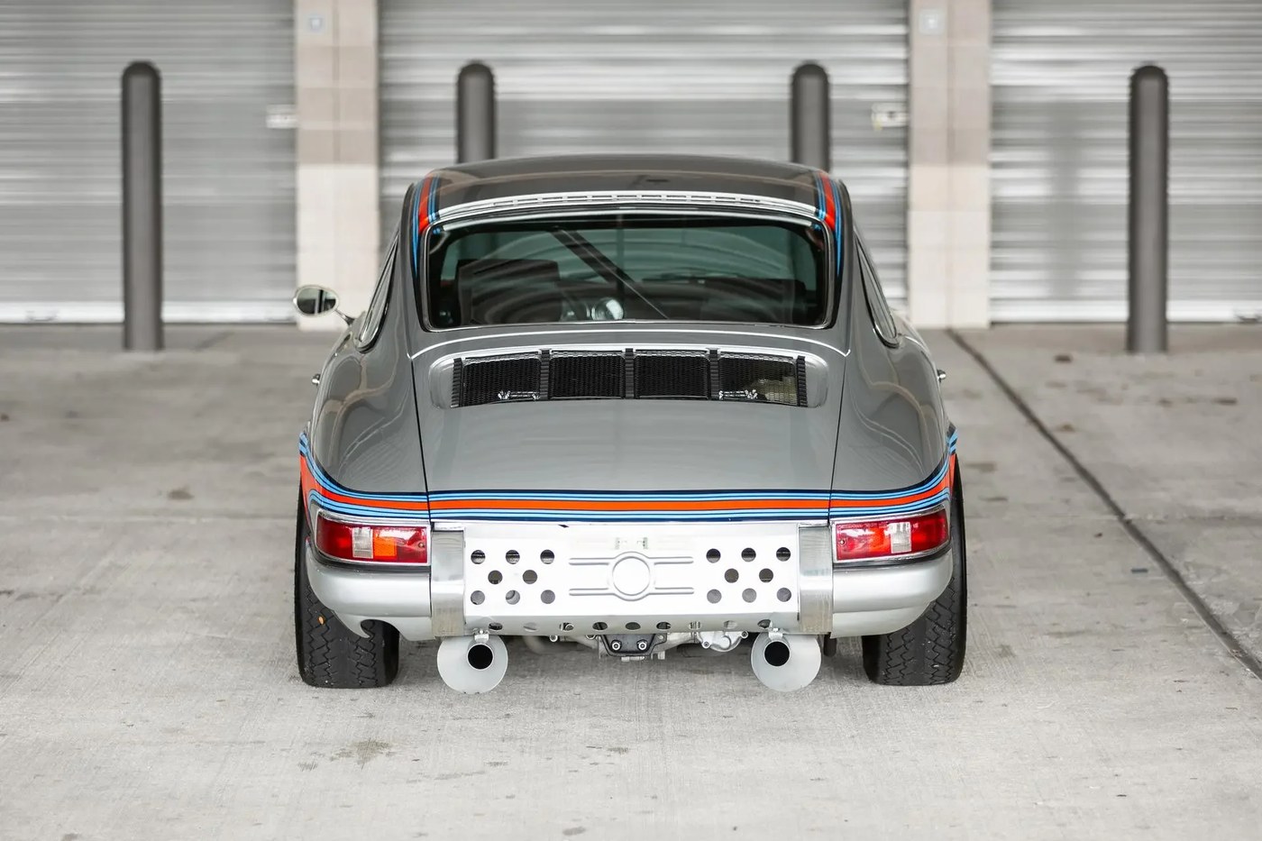 1967 Porsche 911S rear view in a garage bay